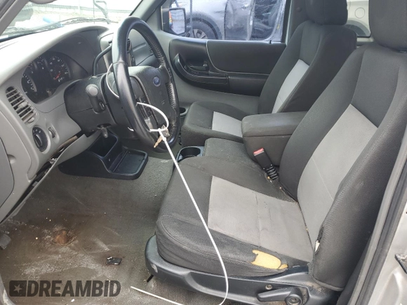 2010 Ford Ranger XL with VIN 1FTKR1ED2APA32215, listed as a Copart auction lot 58259345 with 226,017 mi miles and Salvage title. Bid and sale history available at DreamBid. Image 7.
