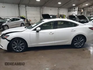 2019 Mazda 6 Grand Touring with VIN JM1GL1TYXK1505439, listed as a IAAI auction lot 41672678 with 52,990 mi miles and . Bid and sale history available at carsss.com. Image 14.