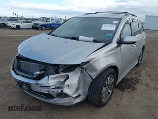 2014 Honda Odyssey Touring with VIN 5FNRL5H93EB066162, listed as a IAAI auction lot 41734783 with 173,063 mi miles and . Bid and sale history available at DreamBid. Image 6.