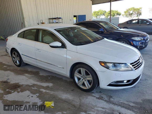 2014 Volkswagen CC R-Line with VIN WVWBP7AN6EE521807, listed as a Copart auction lot 74177764 with 142,779 mi miles and Clean Title. Bid and sale history available at carsss.com. Image 4.