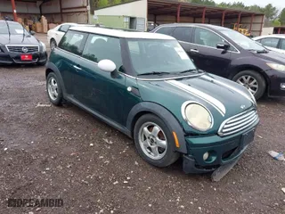 2009 MINI Cooper Hardtop with VIN WMWMF33579TW72493, listed as a IAAI auction lot 41861584 with 136,341 mi miles. Bid and sale history available at carsss.com. Image 1.