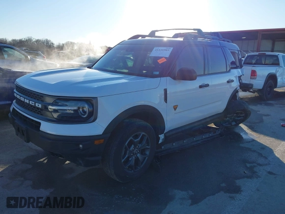 2022 Ford Bronco Sport Badlands z VIN 3FMCR9D93NRE10343, wystawiony jako IAAI lot #41446985 z przebiegiem 37 955 mil mil oraz . Historia ofert i sprzedaży dostępna na DreamBid. Obrazek 2.