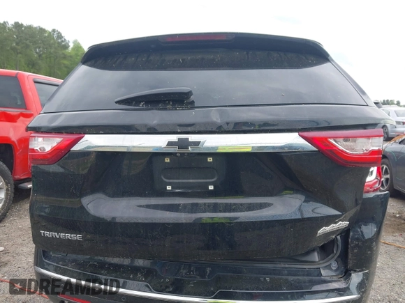 2020 Chevrolet Traverse High Country with VIN 1GNERNKW3LJ186049, listed as a IAAI auction lot 42010235 with 125,847 mi miles and . Bid and sale history available at DreamBid. Image 16.