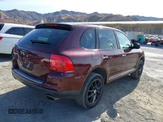 2004 Porsche Cayenne S with VIN WP1AB29P94LA64051, listed as a IAAI auction lot 41226699 with 130,947 mi miles. Bid and sale history available at carsss.com. Image 4.