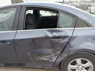 2014 Chevrolet Cruze 1LT with VIN 1G1PC5SB3E7467938, listed as a IAAI auction lot 41900700 with 125,040 mi miles and . Bid and sale history available at DreamBid. Image 6.