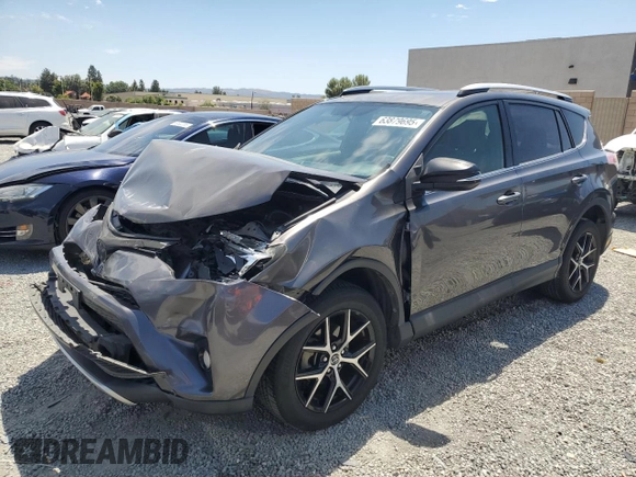 2016 Toyota RAV4 SE with VIN JTMNFREV2GJ072643, listed as a Copart auction lot 63879695 with 104,118 mi miles and Salvage title. Bid and sale history available at DreamBid. Image 1.