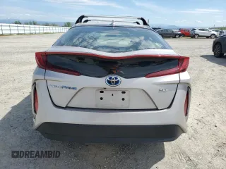 2021 Toyota Prius LE with VIN JTDKAMFP5M3165564, listed as a Copart auction lot 49930215 with 24,742 mi miles and Salvage Title. Bid and sale history available at DreamBid. Image 6.