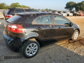 2014 Kia Rio EX with VIN KNADN5A34E6325423, listed as a Copart auction lot 69116324 with 104,083 mi miles and Salvage Title. Bid and sale history available at carsss.com. Image 3.