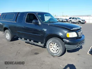 2002 Ford F-150 XL z VIN 1FTRX18L82NA07615, wystawiony jako IAAI lot #42097831 z przebiegiem Nie podano mil oraz . Historia ofert i sprzedaży dostępna na DreamBid. Obrazek 1.