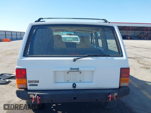 1995 Jeep Cherokee Sport with VIN 1J4FJ68S1SL576255, listed as a IAAI auction lot 42178902 with 214,041 mi miles and . Bid and sale history available at DreamBid. Image 16.