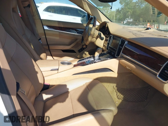 2013 Porsche Panamera with VIN WP0AA2A7XDL014047, listed as a IAAI auction lot 42010031 with 118,681 mi miles and . Bid and sale history available at DreamBid. Image 5.