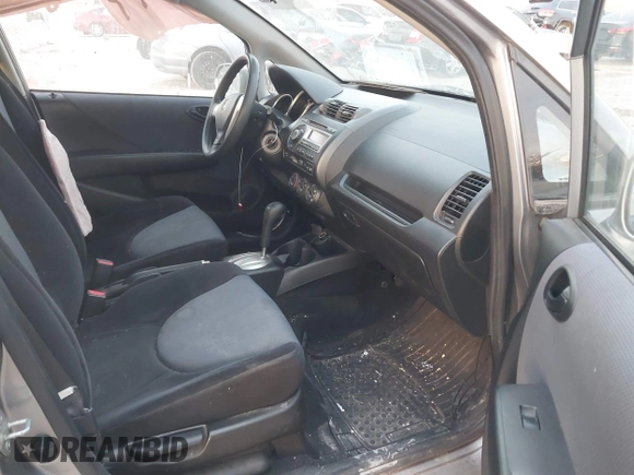 2007 Honda Fit with VIN JHMGD38417S043657, listed as a IAAI auction lot 41025258 with 147,034 mi miles. Bid and sale history available at carsss.com. Image 5.