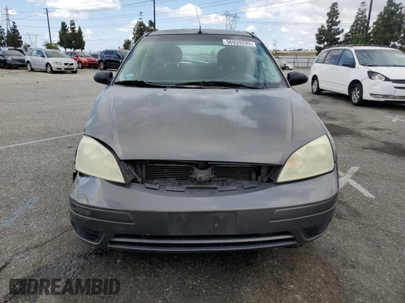 2006 Ford Focus S z VIN 1FAFP37N76W182882, wystawiony jako Copart lot #56939295 z przebiegiem 136 831 mil mil oraz Szkoda całkowita • Salvage title. Historia ofert i sprzedaży dostępna na DreamBid. Obrazek 5.