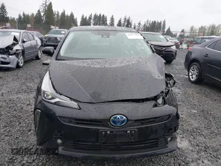 2022 Toyota Prius L Eco with VIN JTDKAMFU2N3154674, listed as a IAAI auction lot 41977505 with 61,552 mi miles and . Bid and sale history available at DreamBid. Image 13.