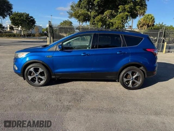 2017 Ford Escape SE with VIN 1FMCU0GD2HUA19806, listed as a Copart auction lot 54800235 with 97,697 mi miles and Salvage Title. Bid and sale history available at carsss.com. Image 12.