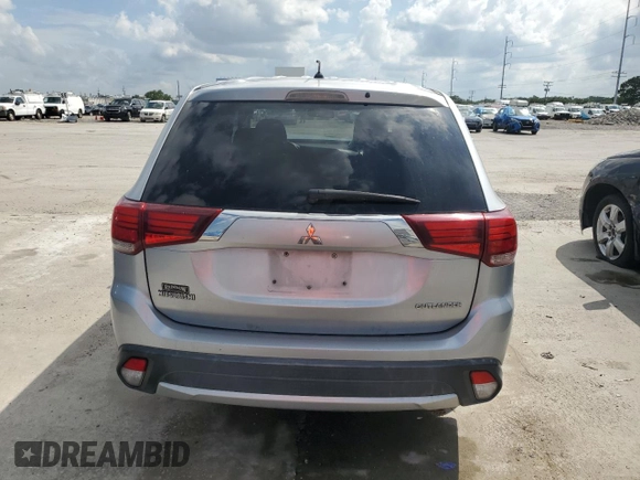 2016 Mitsubishi Outlander ES with VIN JA4AD2A39GZ011172, listed as a Copart auction lot 58392435 with 165,114 mi miles and Salvage title. Bid and sale history available at DreamBid. Image 6.