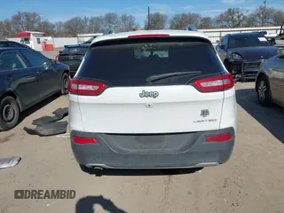 2016 Jeep Cherokee Limited with VIN 1C4PJLDB8GW256788, listed as a IAAI auction lot 41657339 with 104,630 mi miles. Bid and sale history available at carsss.com. Image 16.