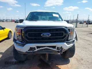 2021 Ford F-150 XL with VIN 1FTFW1E54MFC82133, listed as a IAAI auction lot 42170024 with 24,548 mi miles and . Bid and sale history available at DreamBid. Image 13.