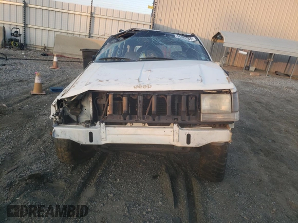 1993 Jeep Grand Cherokee Laredo with VIN 1J4GZ58Y9PC677532, listed as a Copart auction lot 44391245 with 178,772 mi miles and Salvage Title. Bid and sale history available at carsss.com. Image 5.
