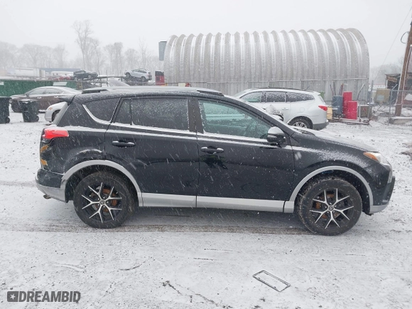 2017 Toyota RAV4 SE with VIN 2T3JFREV5HW591932, listed as a IAAI auction lot 41628183 with 142,599 mi miles. Bid and sale history available at carsss.com. Image 13.