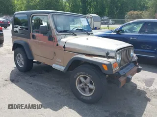 2005 Jeep Wrangler Sport with VIN 1J4FA49SX5P317120, listed as a IAAI auction lot 42677397 with 71,403 mi miles and . Bid and sale history available at DreamBid. Image 1.