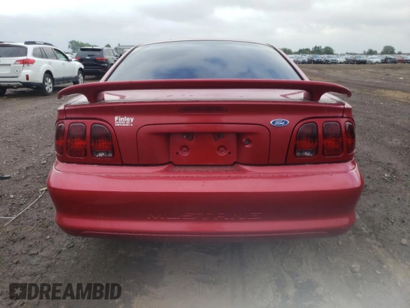 1997 Ford Mustang with VIN 1FALP4040VF166533, listed as a Copart auction lot 66524354 with 71,082 mi miles and Salvage Title. Bid and sale history available at carsss.com. Image 6.