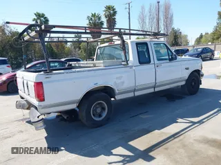 1996 Ford F-150 Special with VIN 1FTEX15N0TKA27266, listed as a IAAI auction lot 41857755 with 325,014 mi miles. Bid and sale history available at carsss.com. Image 4.