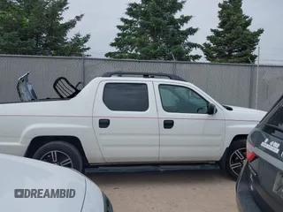 2013 Honda Ridgeline RTL with VIN 5FPYK1F58DB018542, listed as a IAAI auction lot 42465817 with 112,898 mi miles and . Bid and sale history available at DreamBid. Image 14.