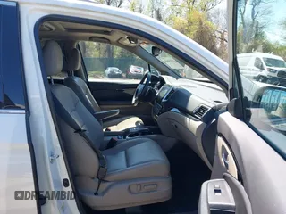 2016 Honda Pilot Touring with VIN 5FNYF6H9XGB005516, listed as a IAAI auction lot 41975049 with 85,217 mi miles. Bid and sale history available at carsss.com. Image 5.