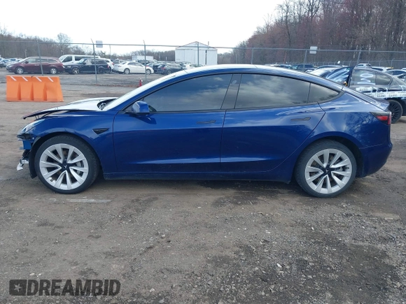 2022 Tesla Model 3 with VIN 5YJ3E1EA7NF188417, listed as a IAAI auction lot 41885623 with 105,457 mi miles and . Bid and sale history available at DreamBid. Image 14.