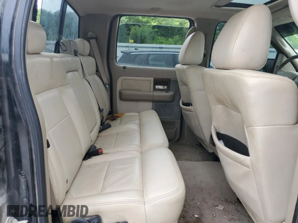 2004 Ford F-150 XLT with VIN 1FTPW14574KB96621, listed as a Copart auction lot 61137655 with 220,659 mi miles and Salvage title. Bid and sale history available at DreamBid. Image 10.