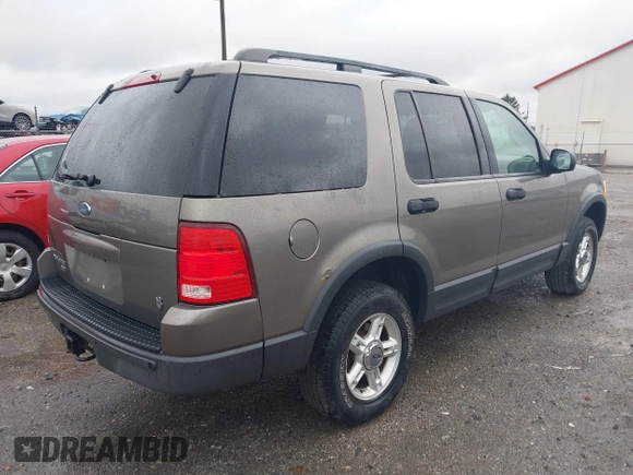 2003 Ford Explorer XLT z VIN 1FMZU73W23ZB48182, wystawiony jako IAAI lot #41979806 z przebiegiem 105 499 mil mil oraz . Historia ofert i sprzedaży dostępna na DreamBid. Obrazek 4.