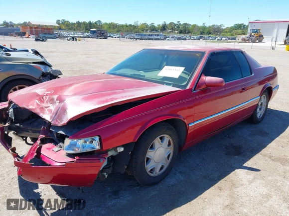 2002 Cadillac Eldorado ESC z VIN 1G6EL12Y72B102153, wystawiony jako IAAI lot #41861541 z przebiegiem 91 273 mil mil oraz . Historia ofert i sprzedaży dostępna na DreamBid. Obrazek 17.