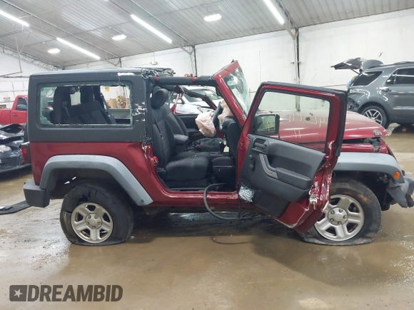2011 Jeep Wrangler Sport z VIN 1J4AA2D19BL613164, wystawiony jako IAAI lot #42514207 z przebiegiem Nie podano mil oraz . Historia ofert i sprzedaży dostępna na DreamBid. Obrazek 12.