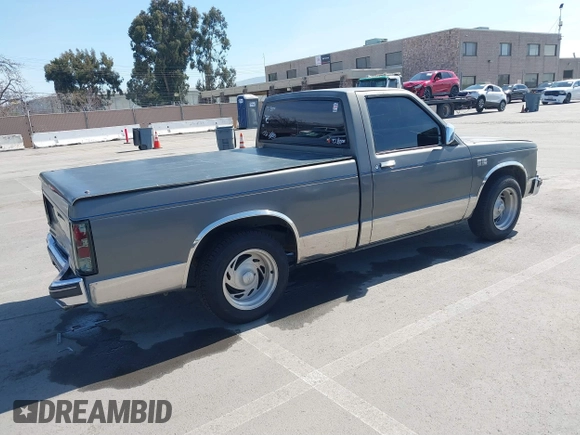 1987 GMC Sonoma with VIN 1GTBS14E2H8501760, listed as a IAAI auction lot 41852033 with 175,529 mi miles and . Bid and sale history available at DreamBid. Image 4.
