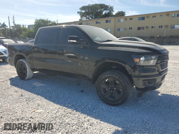 2021 Ram 1500 Lone Star with VIN 1C6RREFT2MN660620, listed as a Copart auction lot 49831035 with 49,276 mi miles and Salvage title. Bid and sale history available at DreamBid. Image 4.