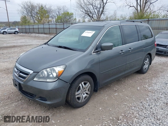 2007 Honda Odyssey EX-L with VIN 5FNRL38627B413638, listed as a IAAI auction lot 41960963 with 172,968 mi miles and . Bid and sale history available at DreamBid. Image 2.