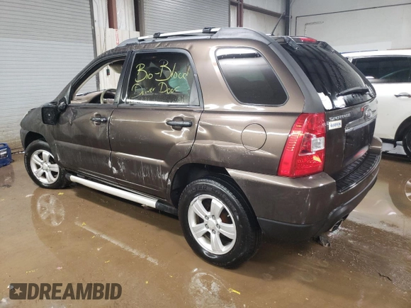 2009 Kia Sportage LX with VIN KNDJF724997571437, listed as a Copart auction lot 51460335 with 161,468 mi miles and Salvage Title. Bid and sale history available at carsss.com. Image 2.