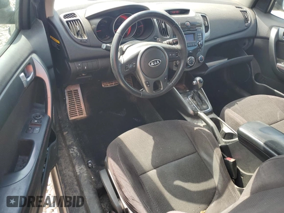 2012 Kia Forte SX с VIN KNAFW6A34C5481086, выставлен на аукционе Copart как лот 57241265 с пробегом 117 233 миль миль и Списание • Salvage title. История ставок и продаж доступна на DreamBid. Изображение 8.