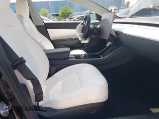 2019 Tesla Model 3 Long Range with VIN 5YJ3E1EB6KF192477, listed as a IAAI auction lot 41981600 with 62,888 mi miles. Bid and sale history available at carsss.com. Image 5.