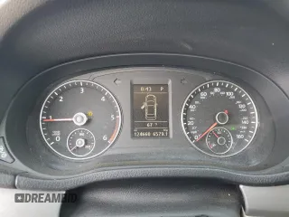 2014 Volkswagen Passat SE with VIN 1VWBN7A32EC088774, listed as a Copart auction lot 60753755 with 124,660 mi miles and Salvage title. Bid and sale history available at DreamBid. Image 9.
