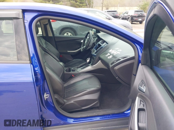 2014 Ford Focus SE with VIN 1FADP3F21EL314534, listed as a IAAI auction lot 42130032 with 103,866 mi miles. Bid and sale history available at carsss.com. Image 5.