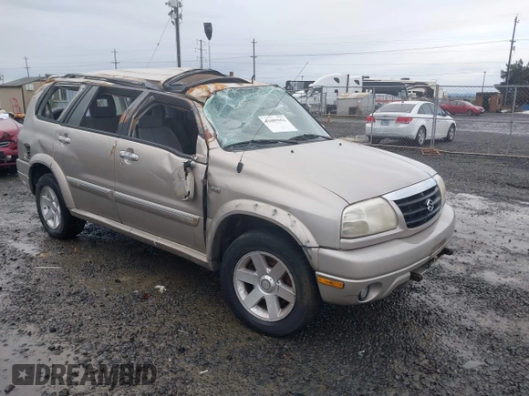2001 Suzuki XL7 Standard z VIN JS3TX92VX14114699, wystawiony jako IAAI lot #41085552 z przebiegiem 195 316 mil mil oraz . Historia ofert i sprzedaży dostępna na DreamBid. Obrazek 1.