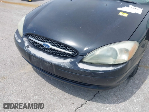 2003 Ford Taurus SE Standard with VIN 1FAFP53U13A102879, listed as a IAAI auction lot 42335795 with 193,023 mi miles and . Bid and sale history available at DreamBid. Image 6.