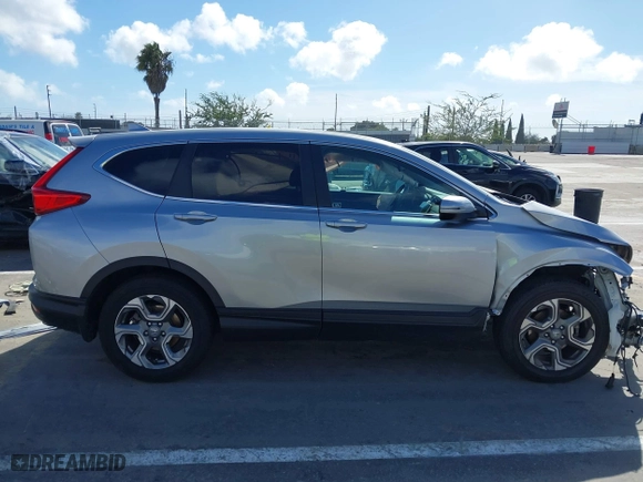 2018 Honda CR-V EX-L with VIN 7FARW1H89JE003282, listed as a IAAI auction lot 41590456 with 67,536 mi miles. Bid and sale history available at carsss.com. Image 14.