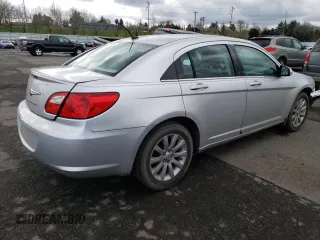 2010 Chrysler Sebring Limited with VIN 1C3CC5FB1AN207161, listed as a Copart auction lot 49421105 with 121,340 mi miles and Salvage Title. Bid and sale history available at DreamBid. Image 3.