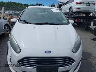 2019 Ford Fiesta SE z VIN 3FADP4BJ2KM143337, wystawiony jako IAAI lot #42179937 z przebiegiem 124 078 mil mil oraz . Historia ofert i sprzedaży dostępna na DreamBid. Obrazek 12.