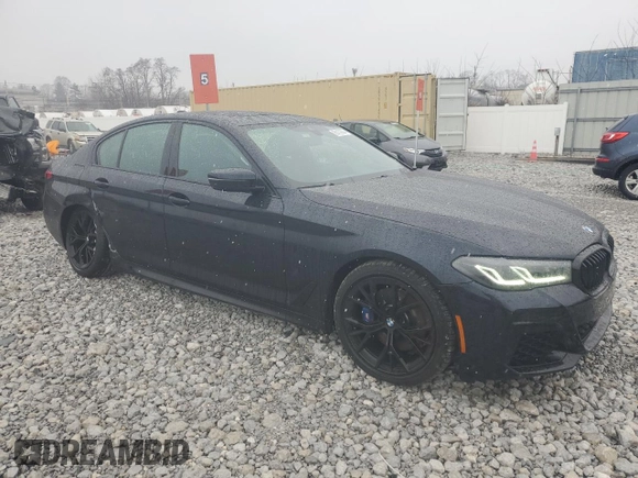 2023 BMW 5 Series 530i xDrive with VIN WBA13BJ0XPWY20712, listed as a Copart auction lot 86109994 with 9,489 mi miles and Salvage Title. Bid and sale history available at DreamBid. Image 4.