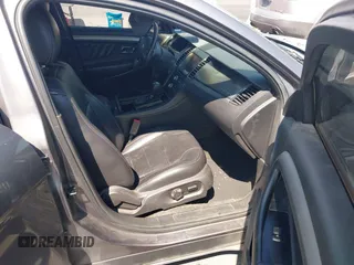 2013 Ford Taurus SEL with VIN 1FAHP2E89DG207904, listed as a IAAI auction lot 42184669 with 147,321 mi miles and . Bid and sale history available at carsss.com. Image 5.