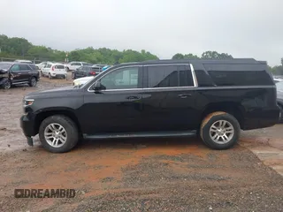 2019 Chevrolet Suburban LT z VIN 1GNSKHKC8KR332167, wystawiony jako IAAI lot #42256453 z przebiegiem 131 882 mil mil oraz . Historia ofert i sprzedaży dostępna na DreamBid. Obrazek 14.
